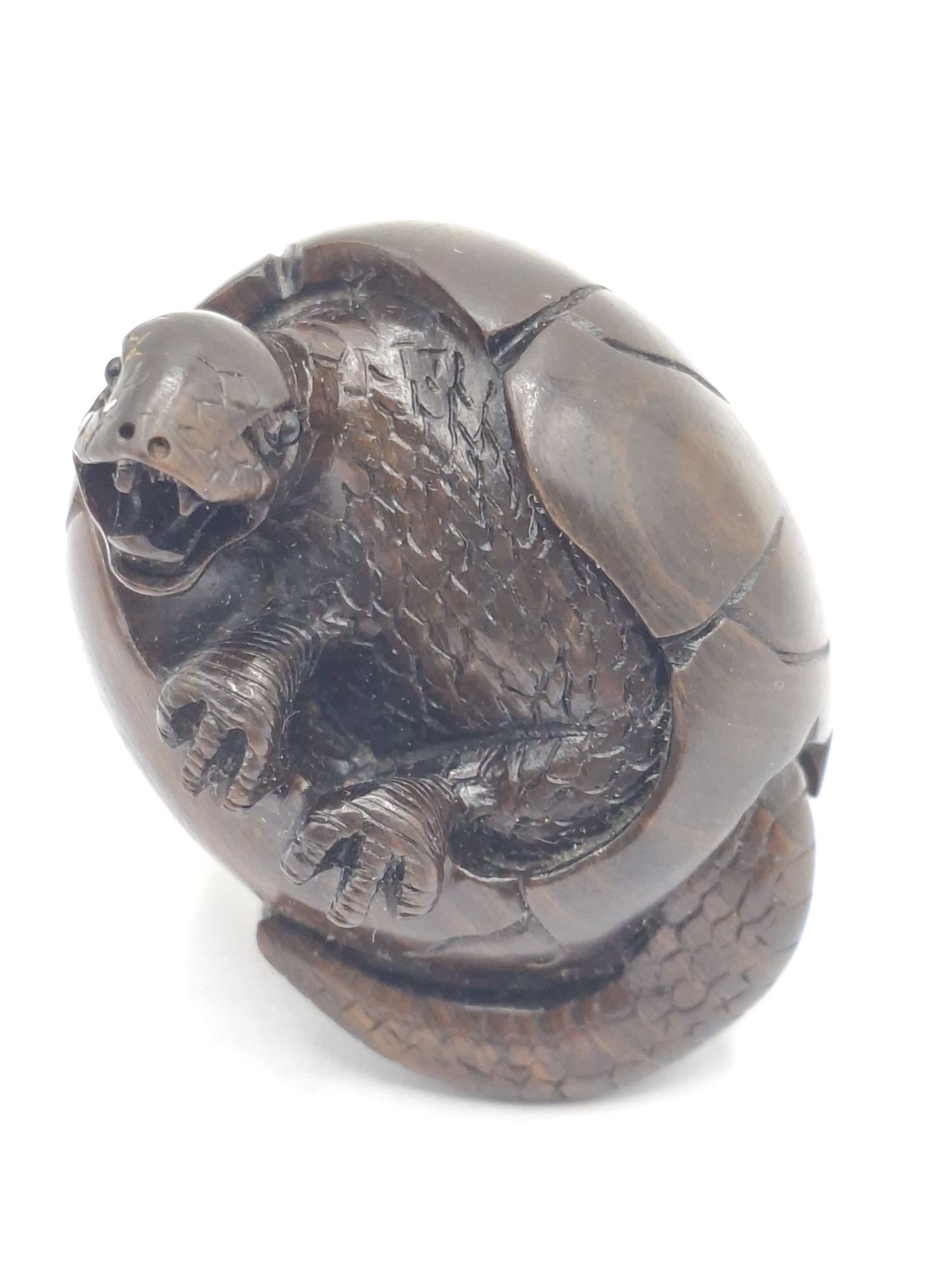 129 · JAPANESE CARVED ROSEWOOD NETSUKE
