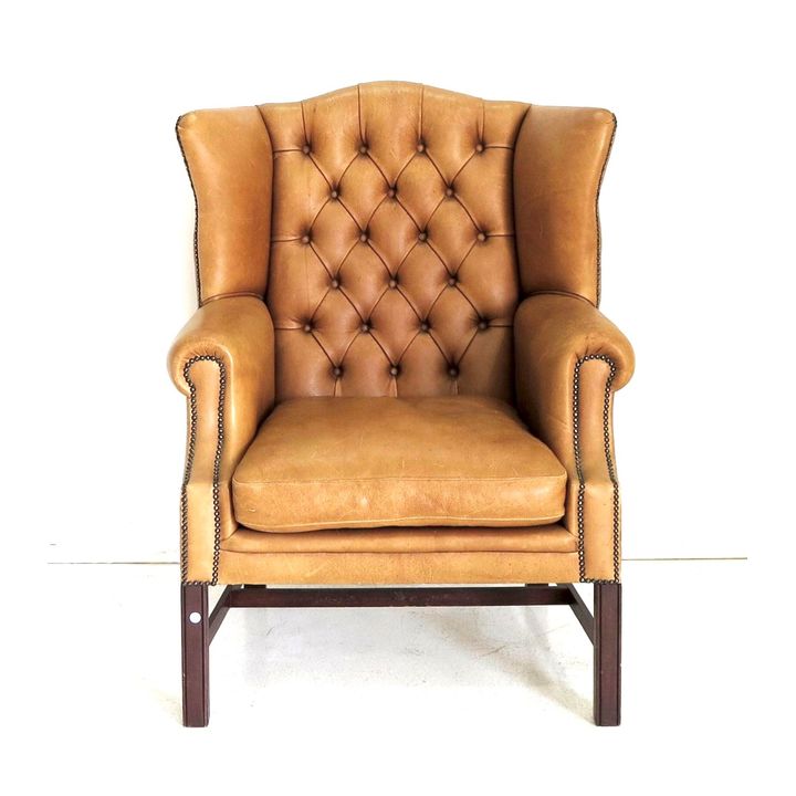 LEATHER UPHOLSTERED WINGBACK CHAIR