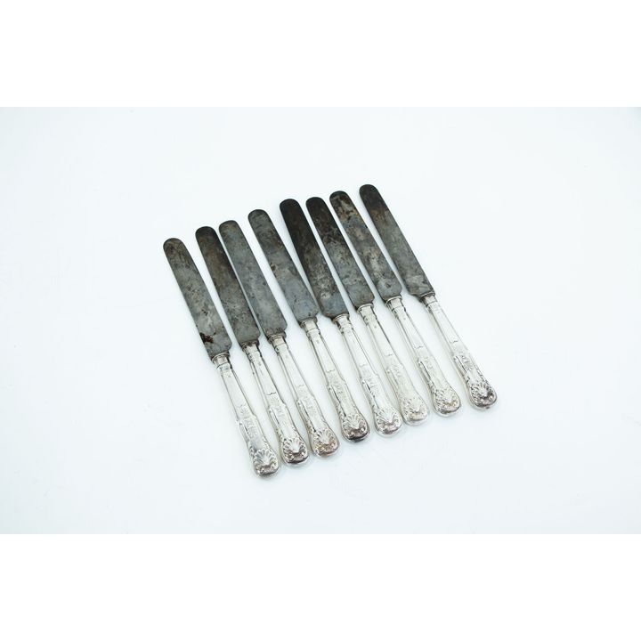 Eight steel-bladed dessert knives