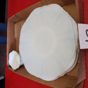 White depression glass plates and refrigerator glass lid