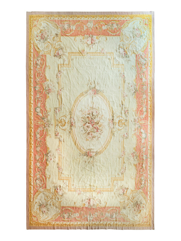 An Aubusson Style Wool Carpet
16 feet x 10 feet 10 inches.