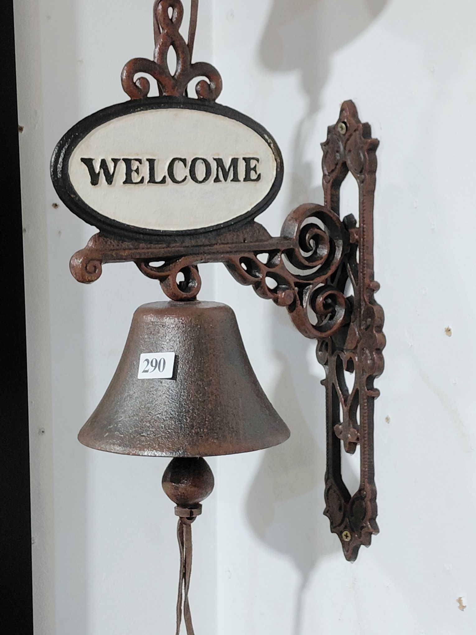 290 · CAST IRON WELCOME SIGN AND BELL