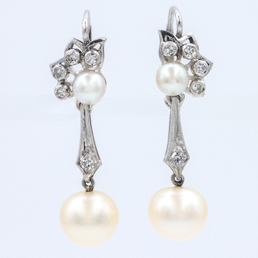 Aretes conlgantes de perla