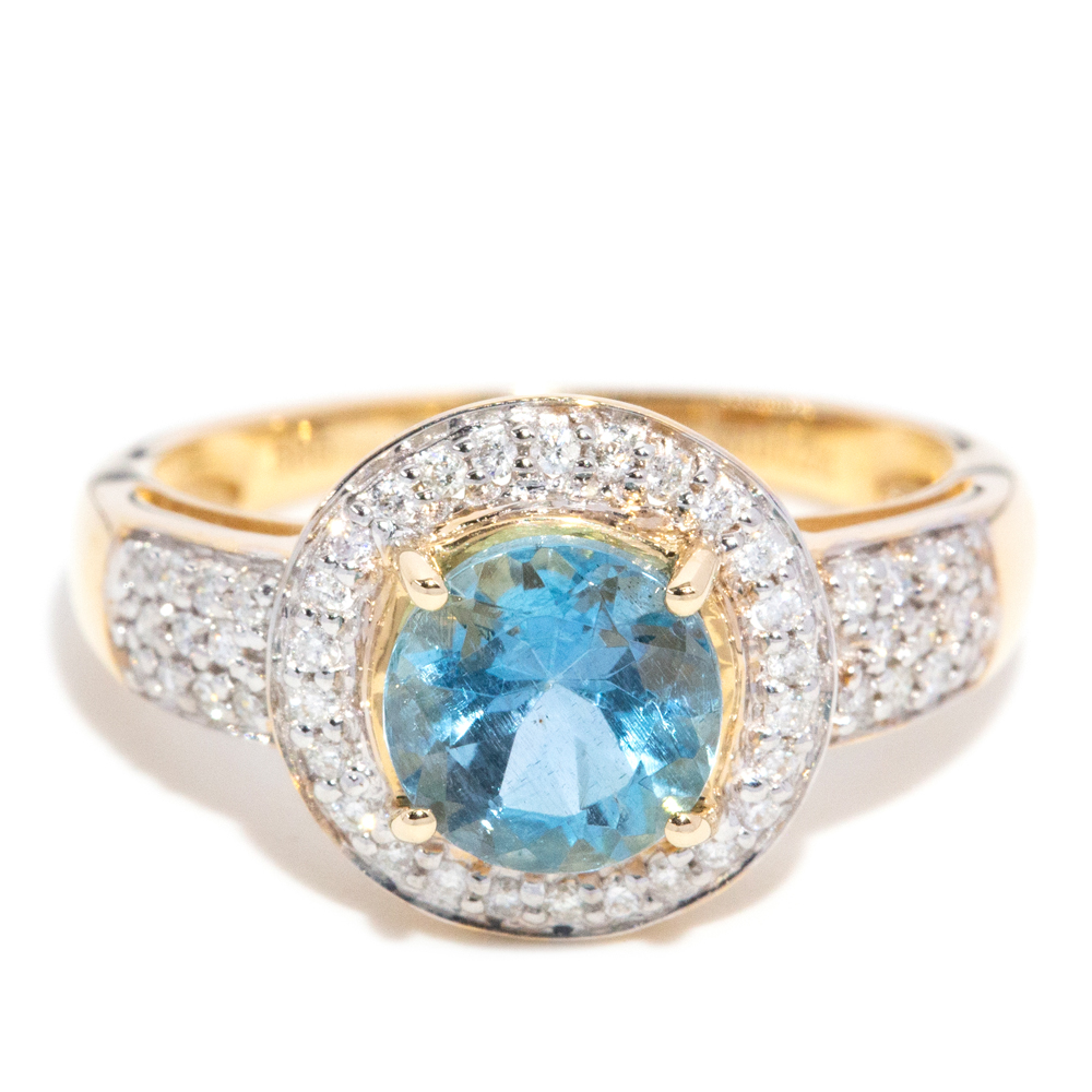 27 · 1.35 Carat Aquamarine & Diamond Halo Ring in 14ct Gold