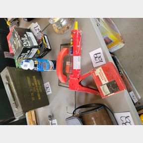 Multi tester, caulking gun and new can of foam sealer