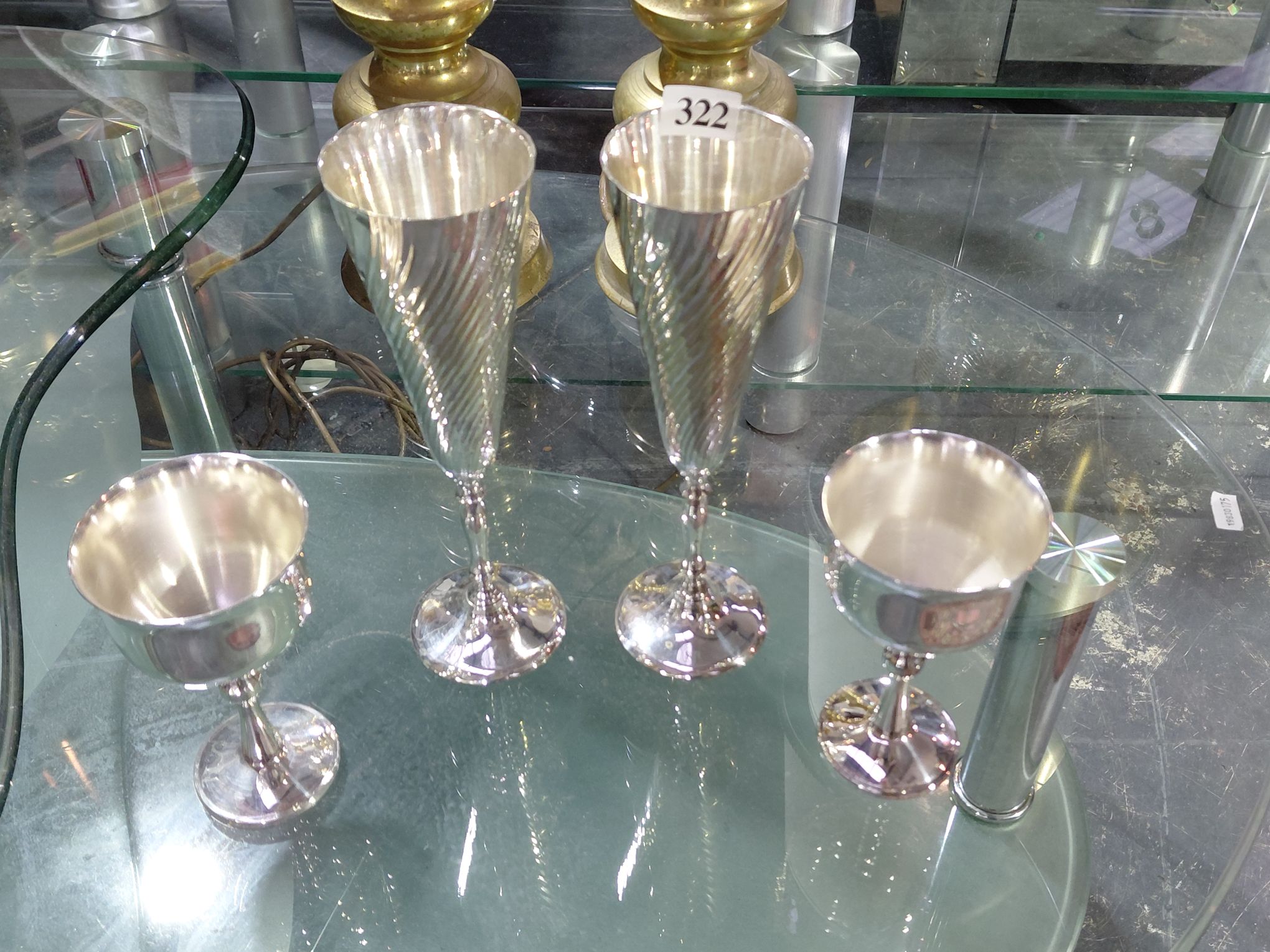 322 · A PAIR OF SILVERPLATE CHAMPAGNE AND WINE GLASSES