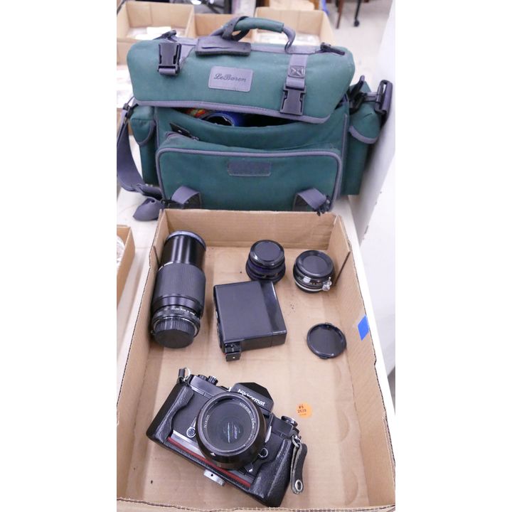 Nikon Nikkormat FT2 35mm Film Camera w/ Lenses including Nikon 50mm f2, Accessores, and Camera Bag