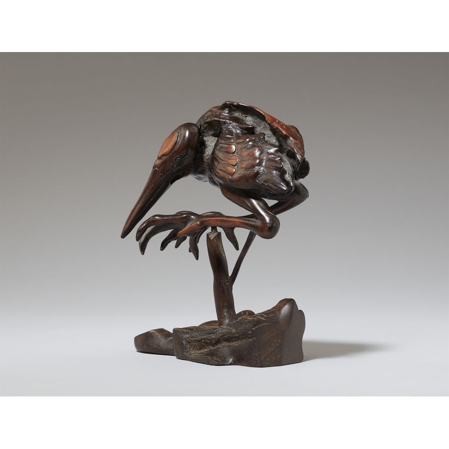 A root wood and tagayasan wood okimono of a crane. 20th century