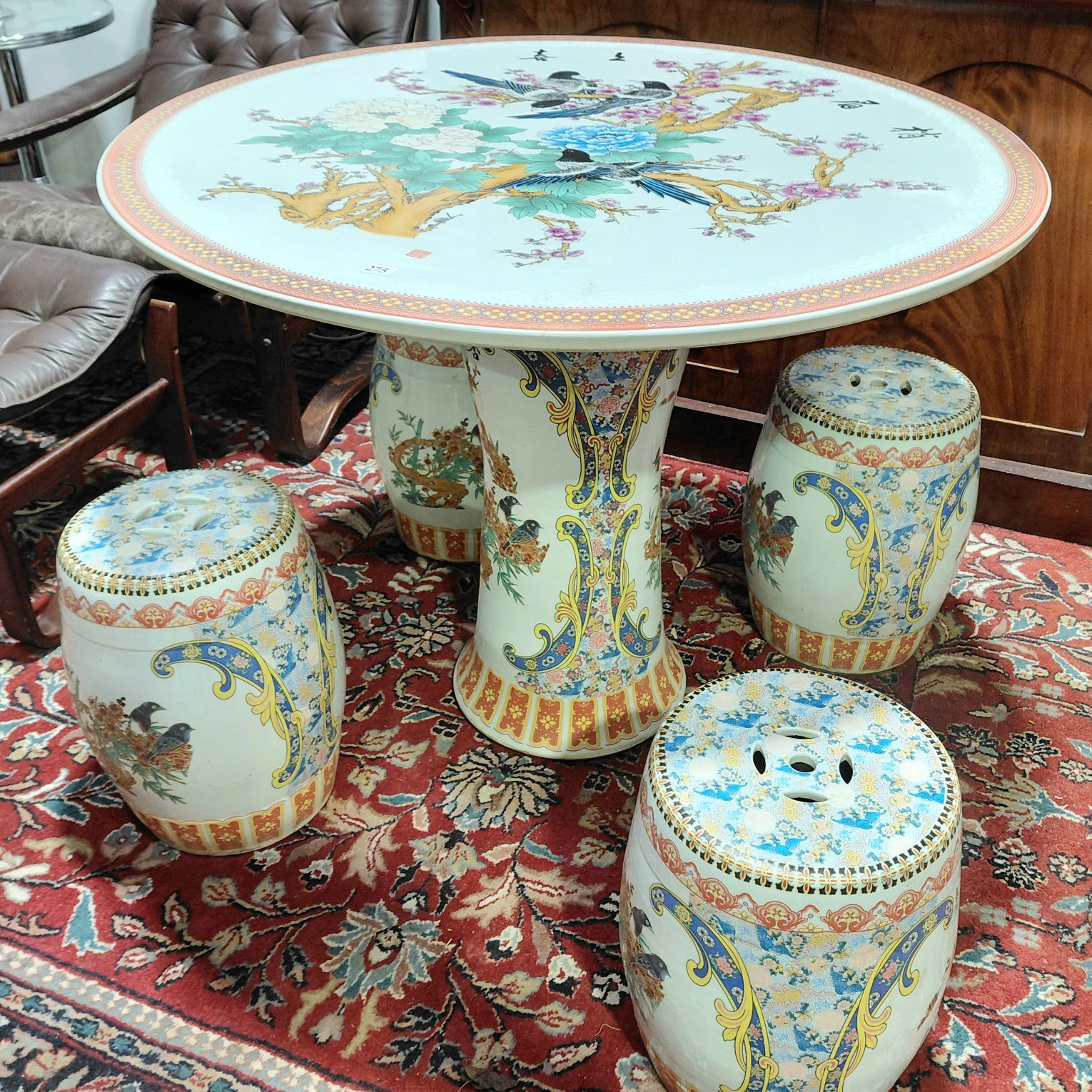 275 · CHINESE CERAMIC TABLE AND STOOLS