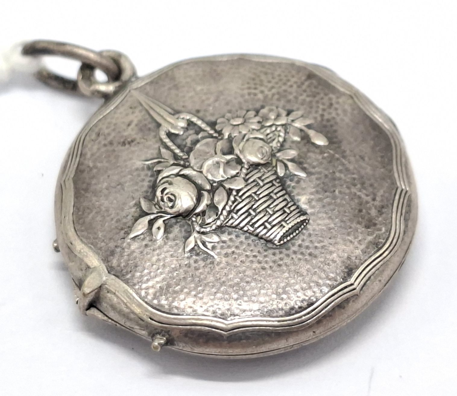 1106 · ANTIQUE STERLING SILVER PENDANT