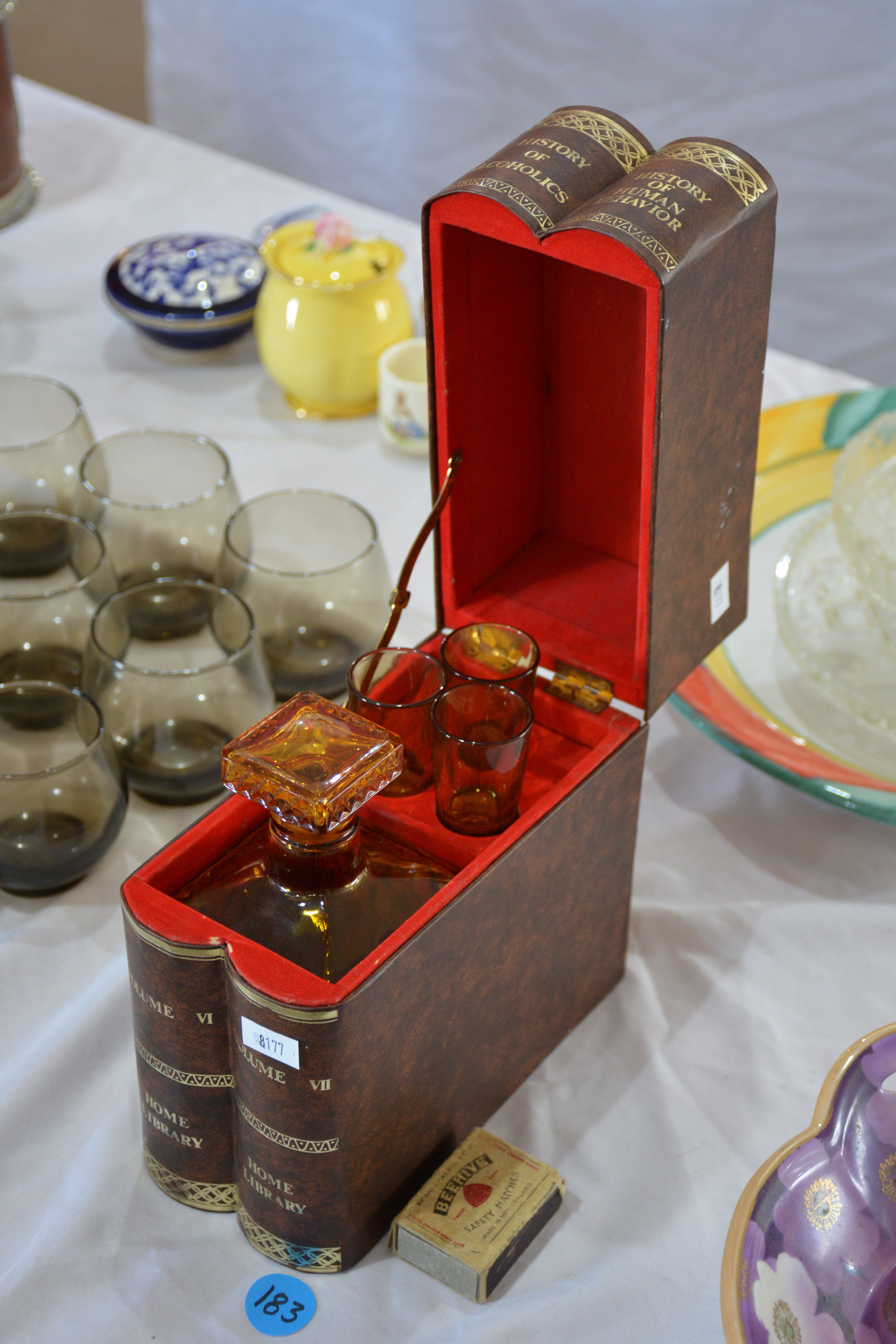 Amber Glass Decanter + 3 Glass Set in Unique Case — sold at auction in New Zealand for $65