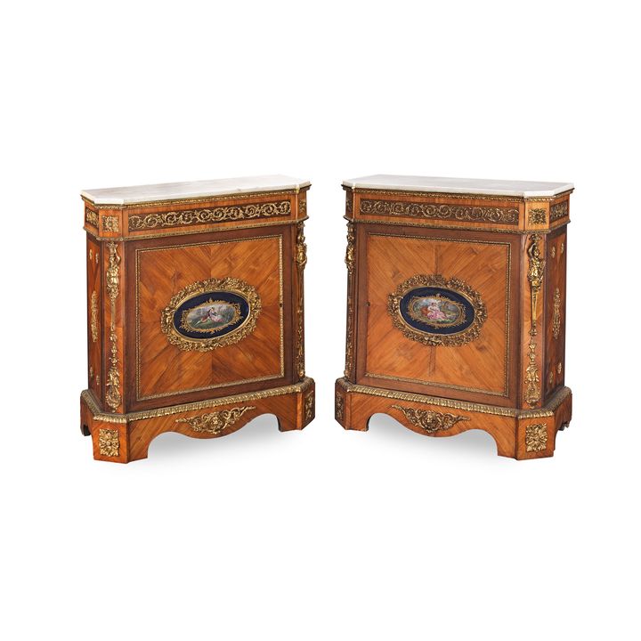 A pair of 19th century Louis XVI style kingwood and tulipwood side cabinets