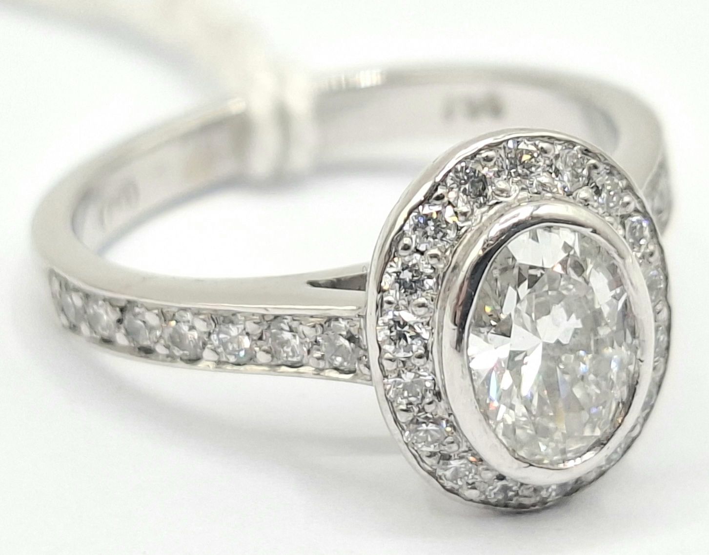 337 · 18CT WHITE GOLD DIAMOND HALO RING