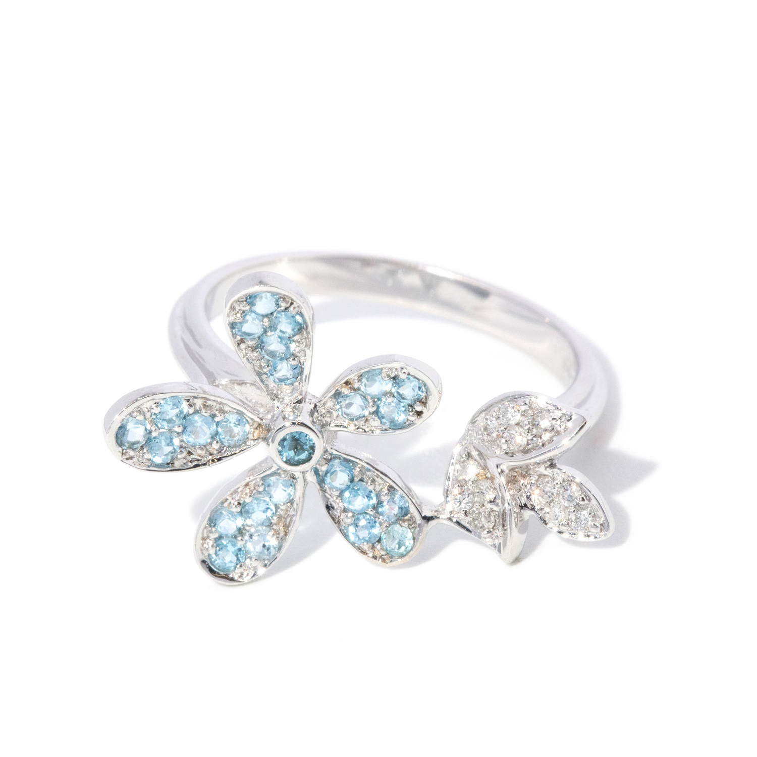 18 carat white gold topaz and diamond flower ring