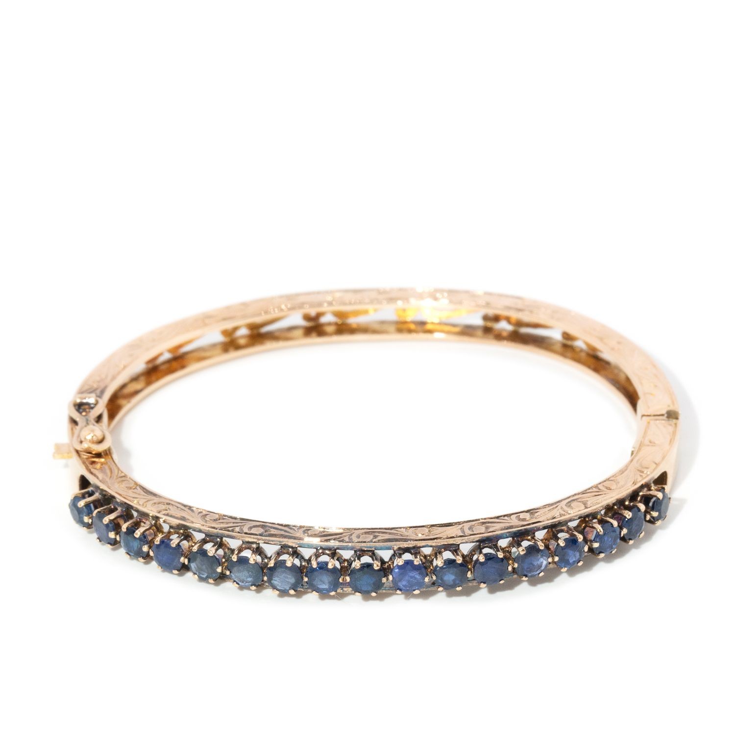 14 carat gold & sapphire hinged bangle