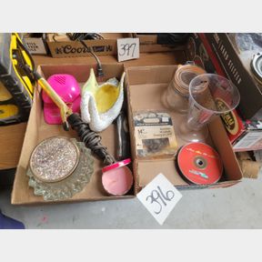 2 Boxes of vintage swan, chainsaw blade and other personal care items