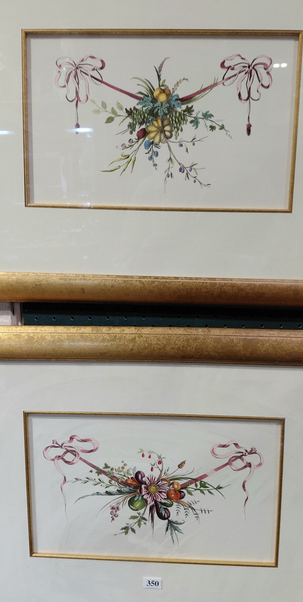 350 · A PAIR OF HAND COLOURED PRINTS