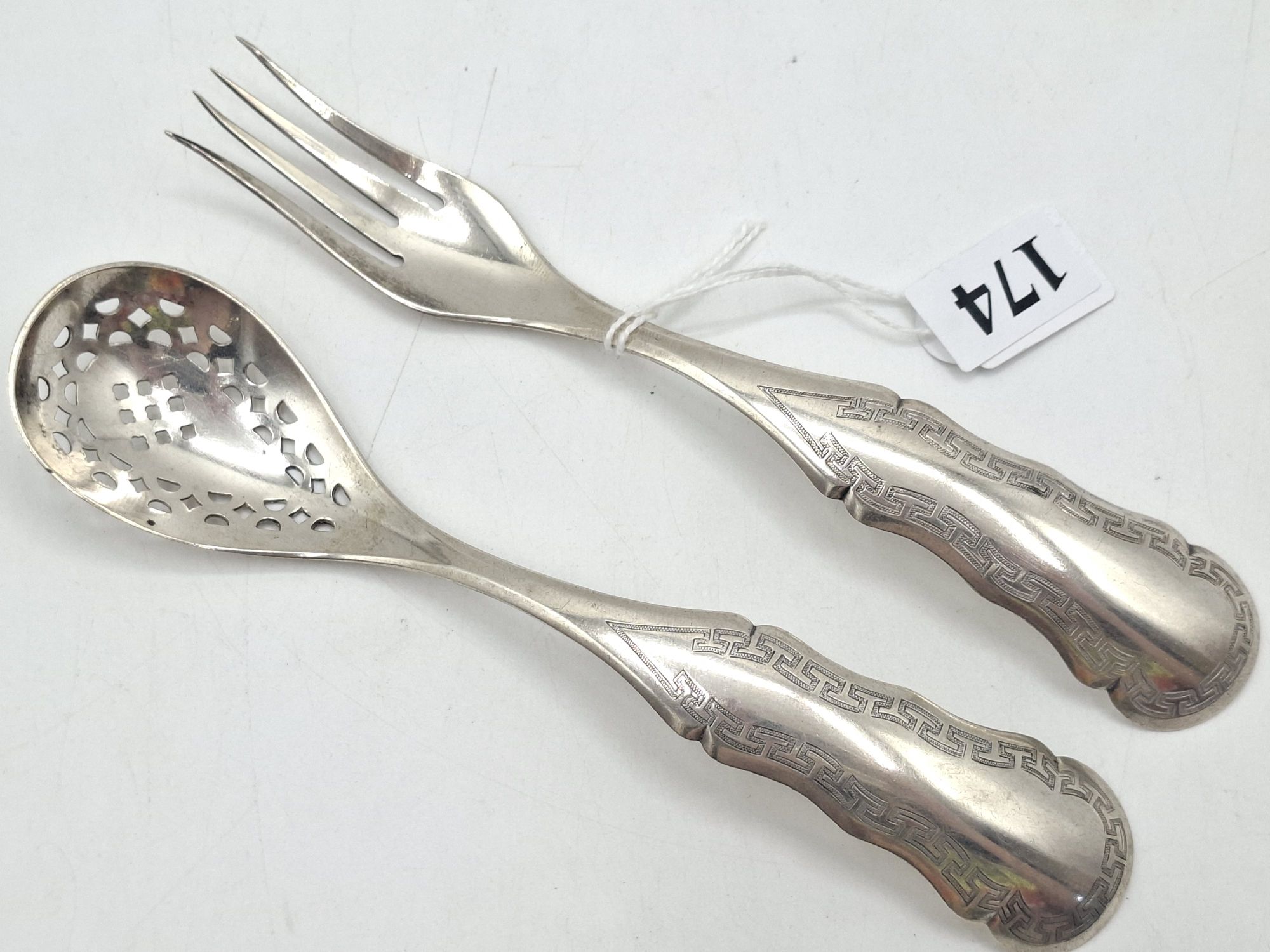 174 · A PAIR OF SILVER SERVERS