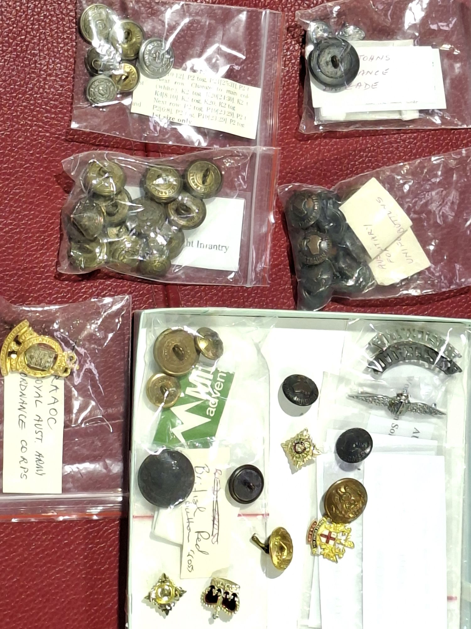 Collection Of Military Buttons And Badges