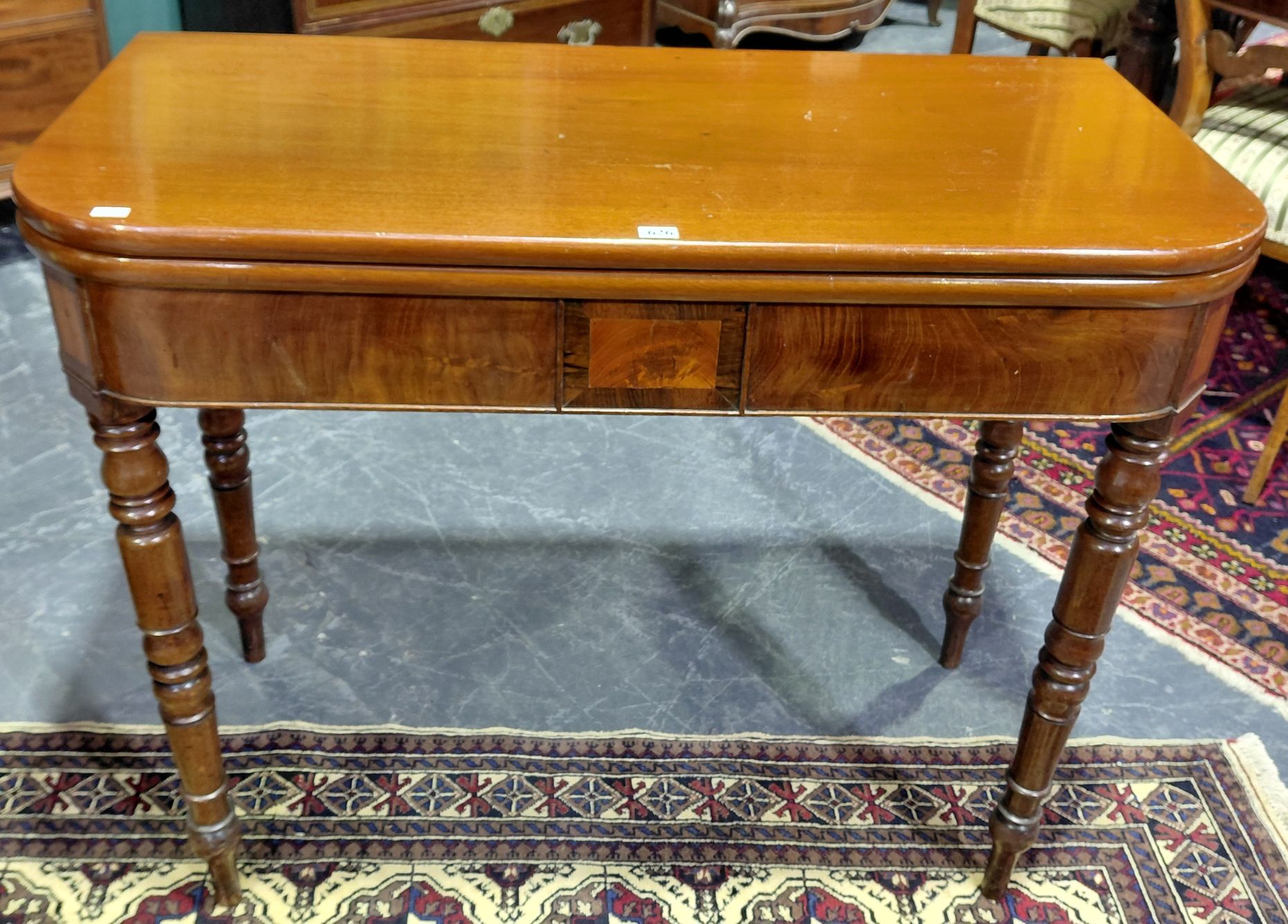 626 · A GEORGIAN FOLDING TEA TABLE