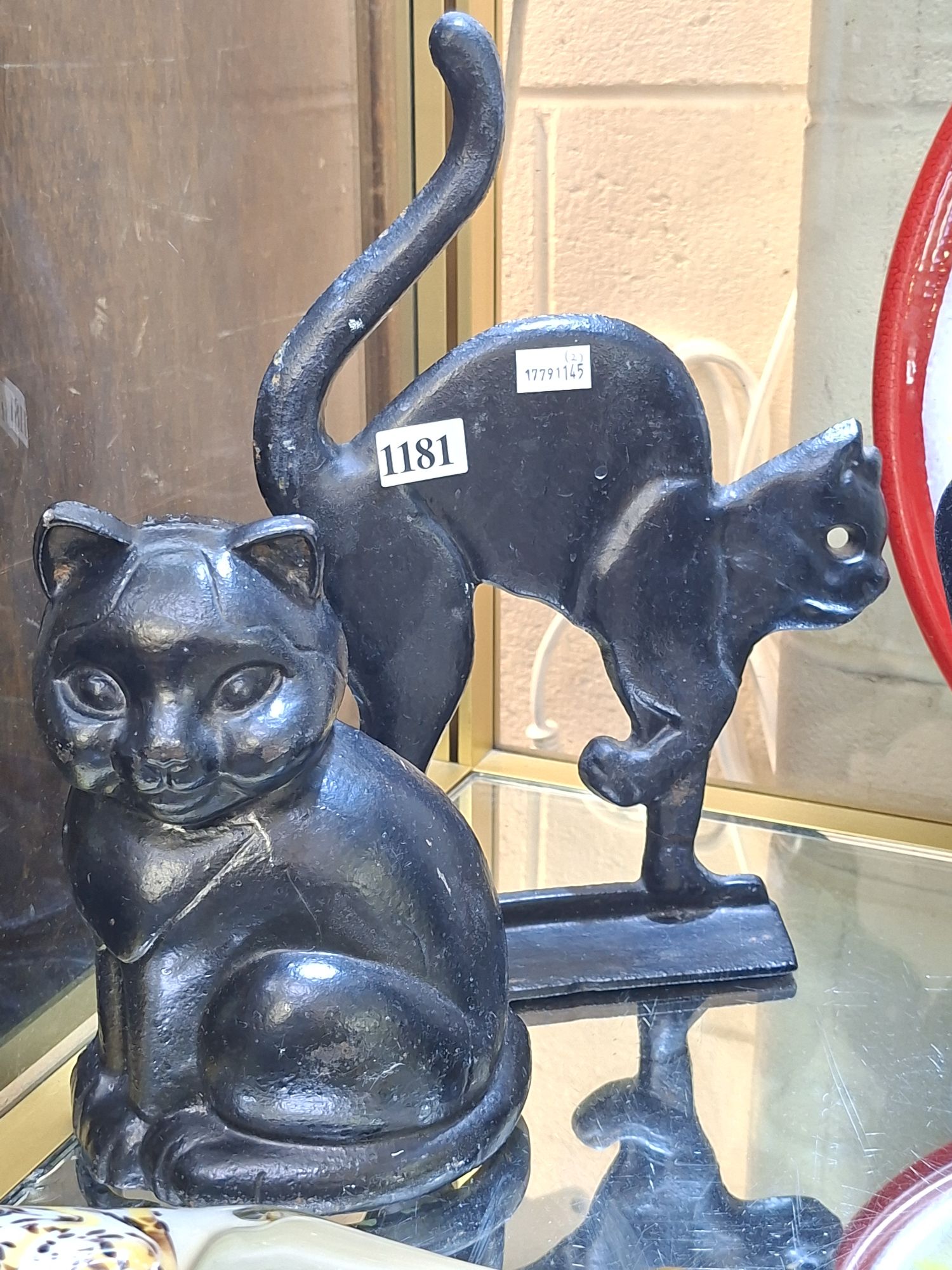 Two Cast Iron Doorstops