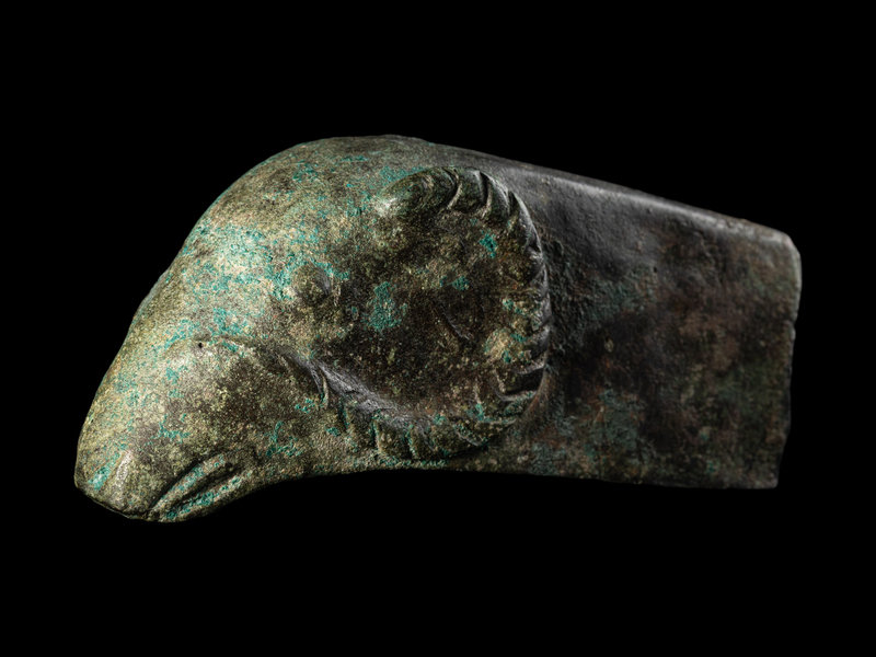 A Luristan Bronze Ram's Head
Length 4 inches (10.2 cm).