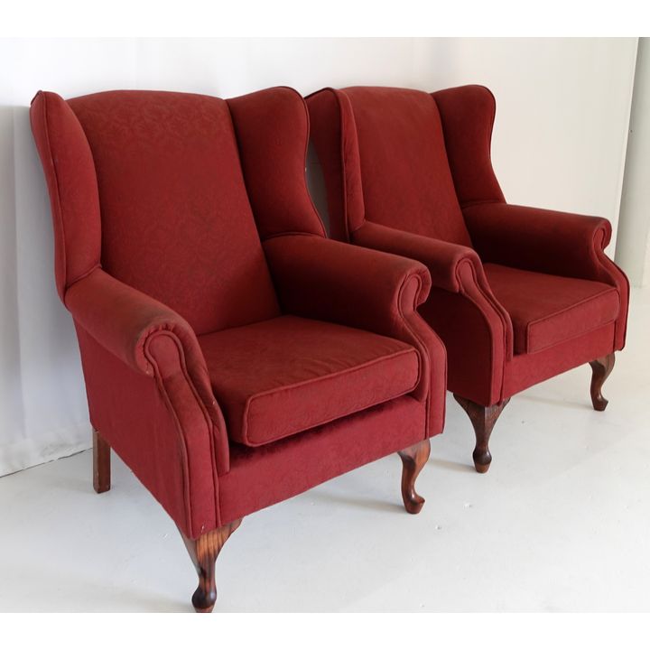 PAIR OF UPHOLSTERED WINGBACK CHAIRS