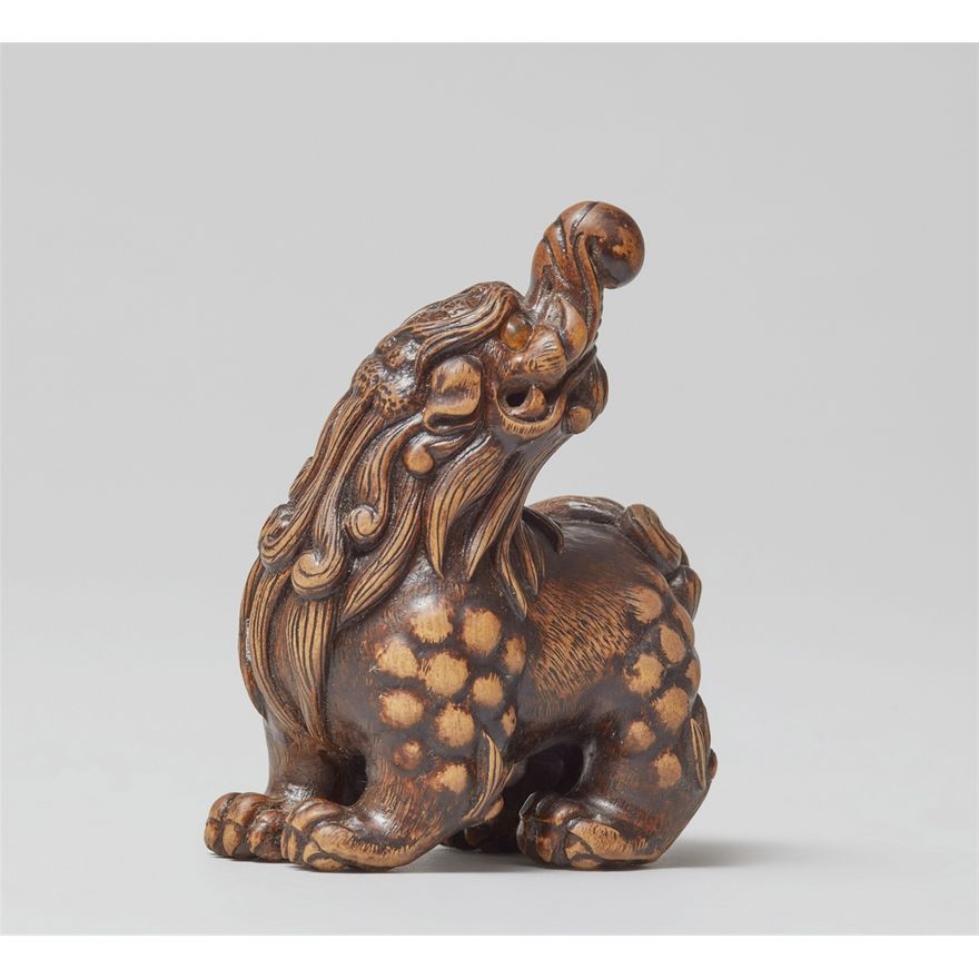 A wood netsuke of a baku. Early 21th century