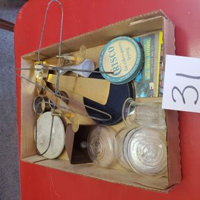 Glass canning lids, cow bell. Napkin rings, metal lids