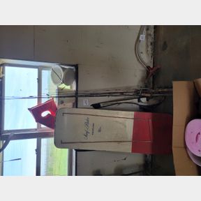 Fishing poles, surf rider board and ice bucket
