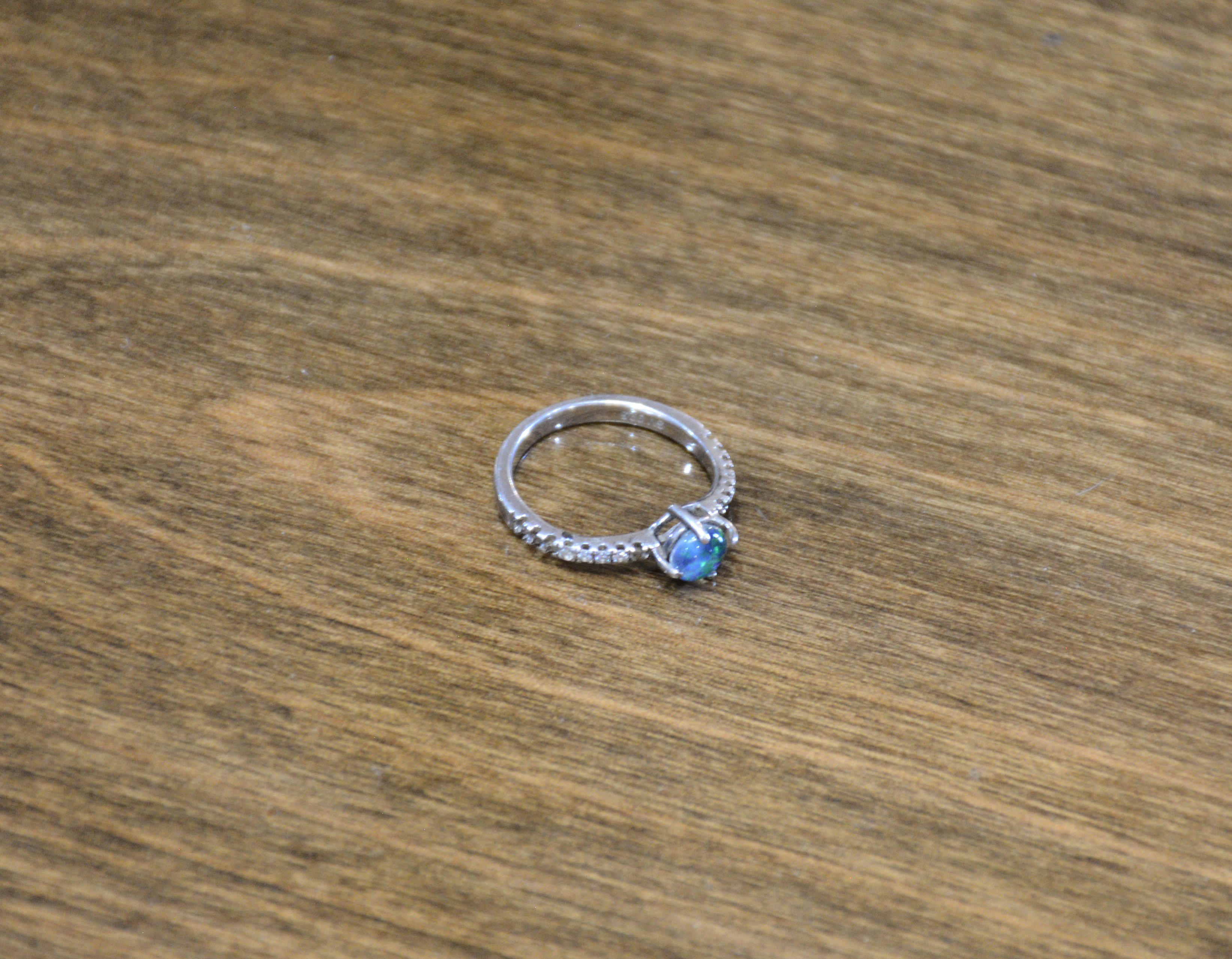 SV 925 Marked White Ring with Opal Stone — NZ auction result