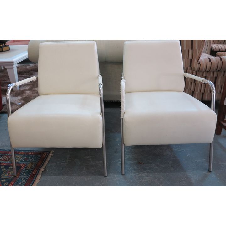 PAIR OF VINYL UPHOLSTERED CHROME ARMCHAIRS,