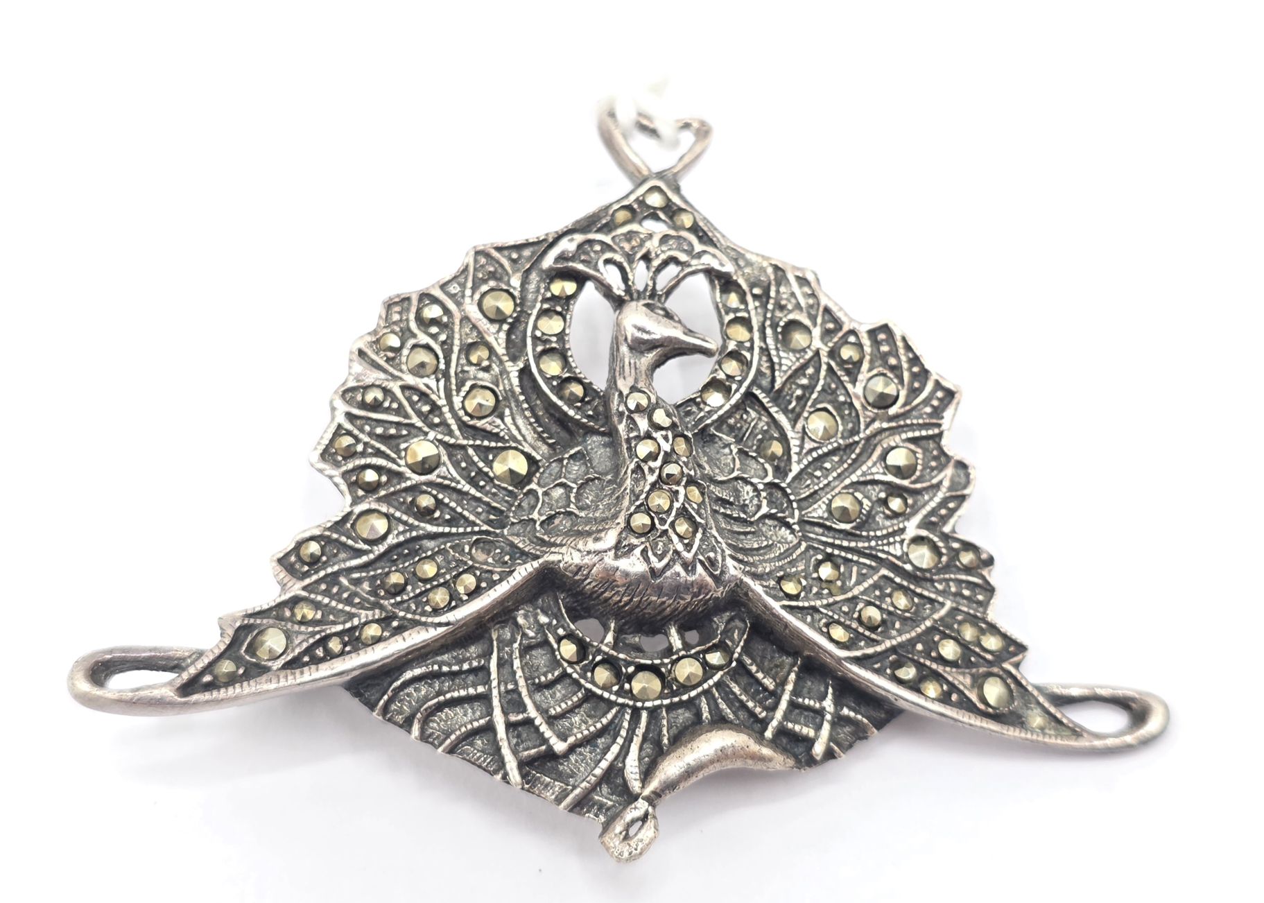 84 · SILVER MARCASITE PEACOCK BROOCH