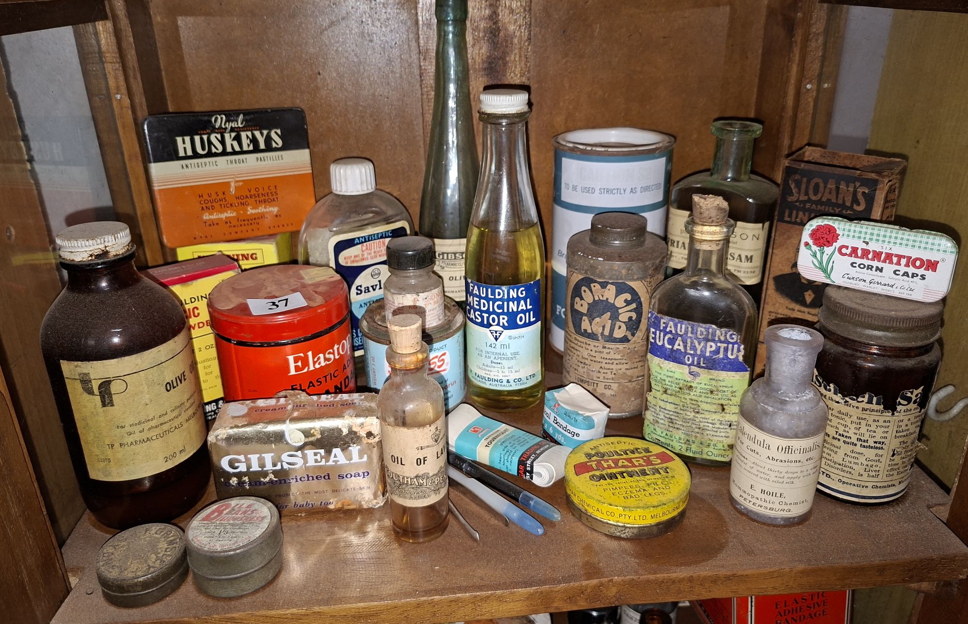 37 · CHEMISTS AND HOME REMEDY TINS