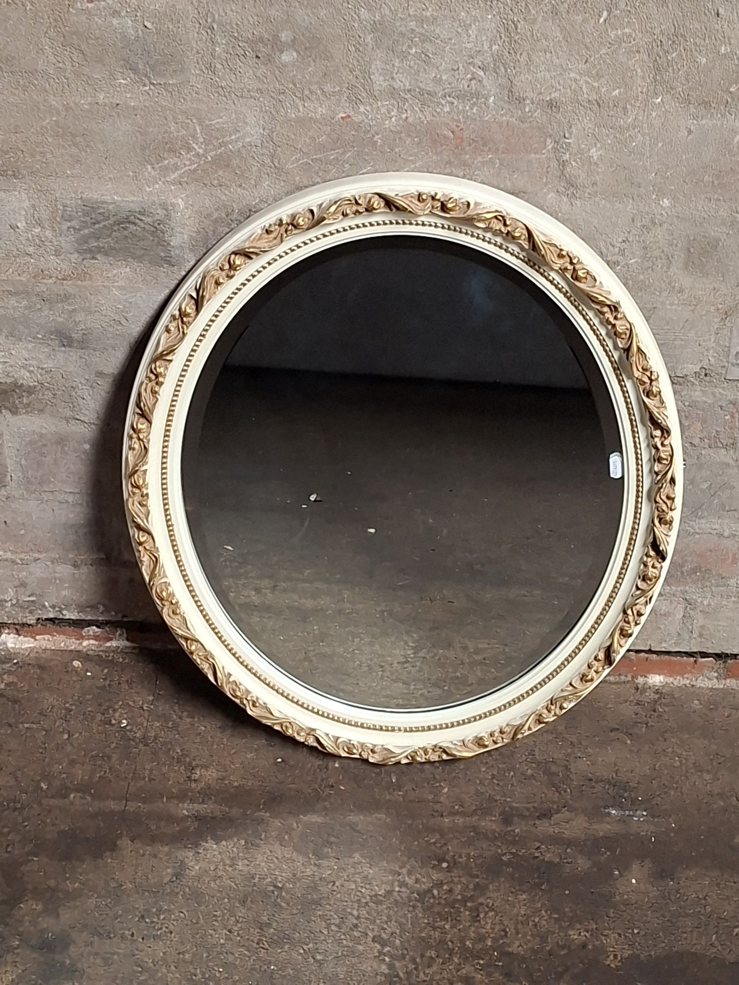 225 · VINTAGE BEVELLED GLASS MIRROR