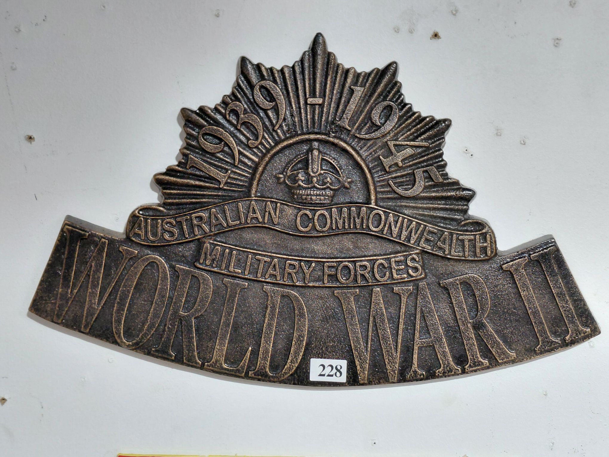 CAST IRON WORLD WAR II WALL PLAQUE