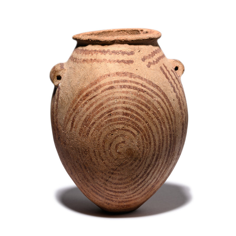 An Egyptian Pottery Jar
Height 4 11/16 inches (12 cm).