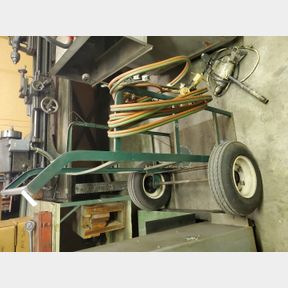 Large industrial torch cart with Victor torch and mismatched gauges