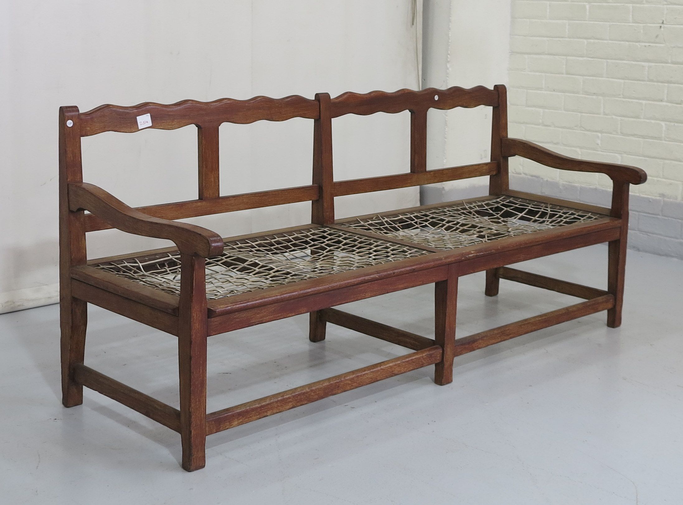 RIEMPIE BENCH, some riempie needs replacing | Westgate Walding Auctioneers