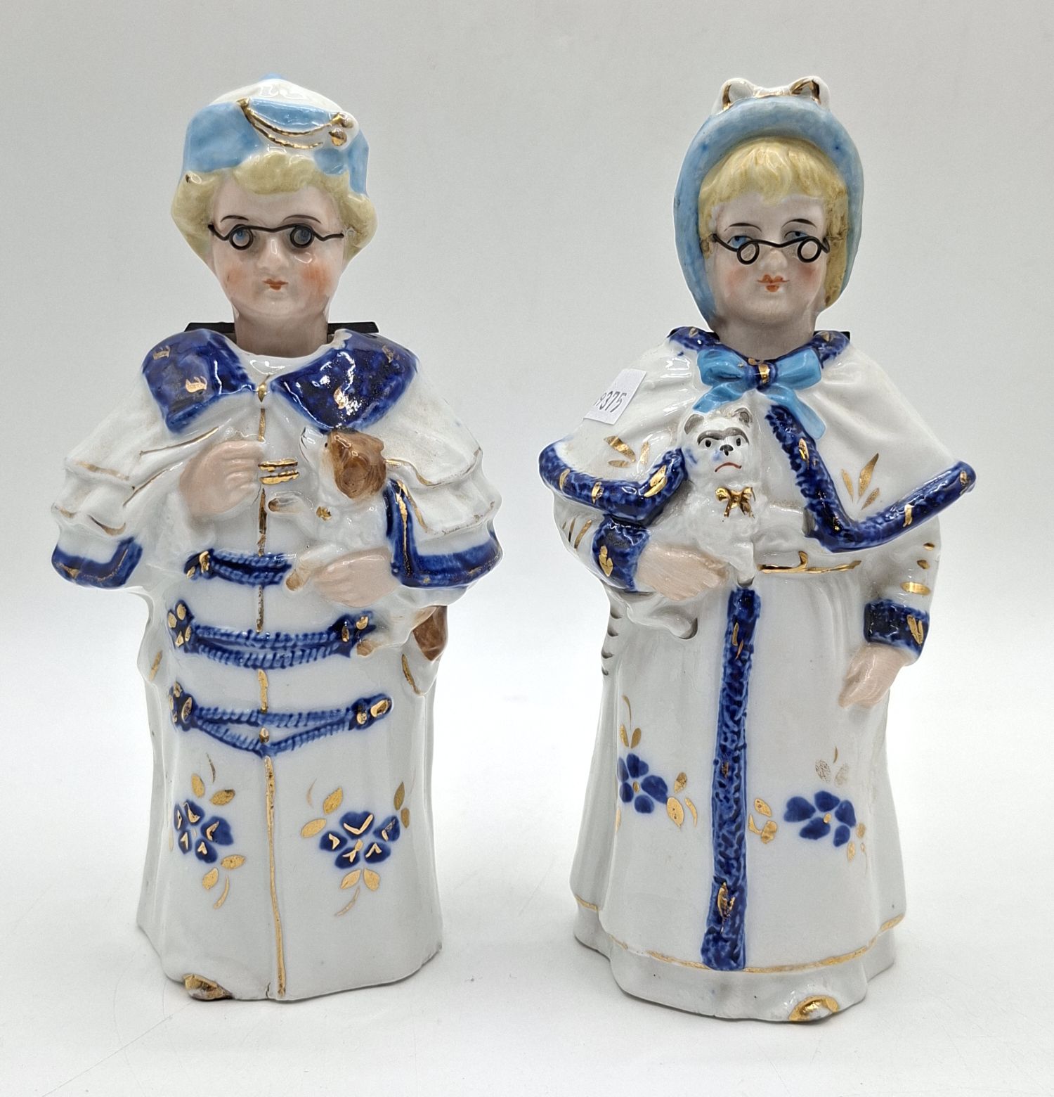 30 · PAIR OF CERAMIC NODDER FIGURINES