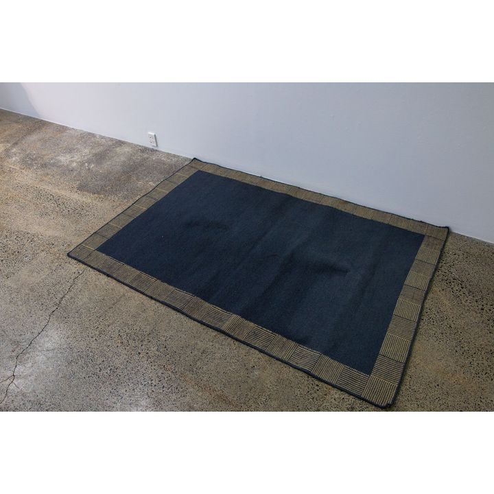 Woollen floor rug