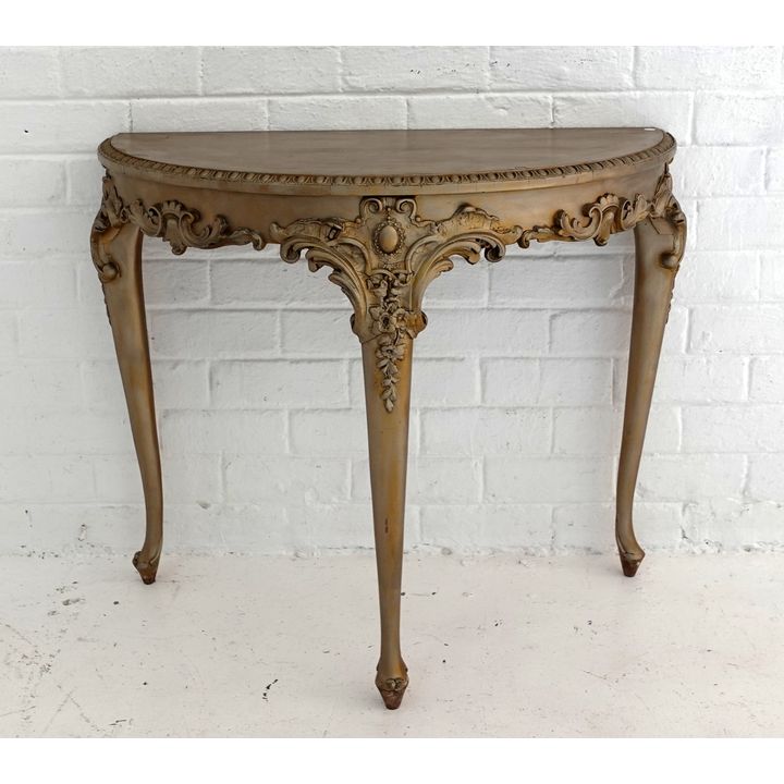 CARVED DEMI-LUNE TABLE