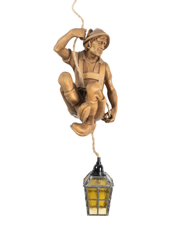 A Swiss Carved Wood "Mountain Climber" Lamp