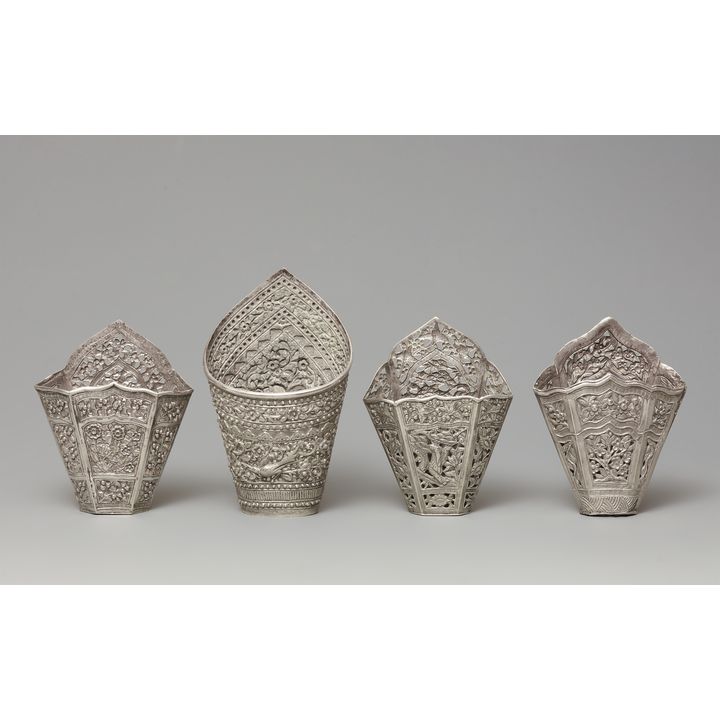 Four NorthernThai silver betel leaf holders. 20th century