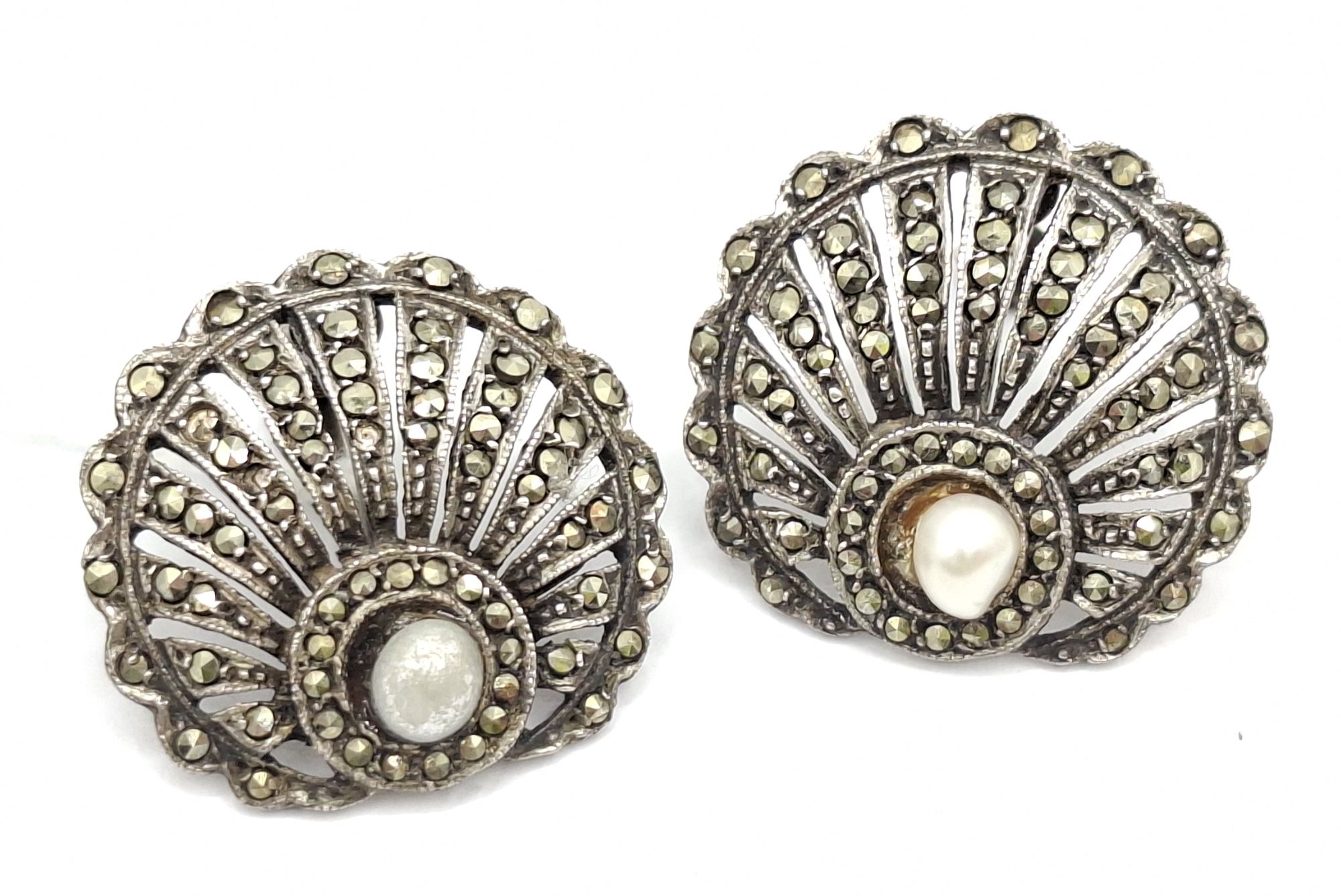 A Pair Of Maracite Shell Earrings