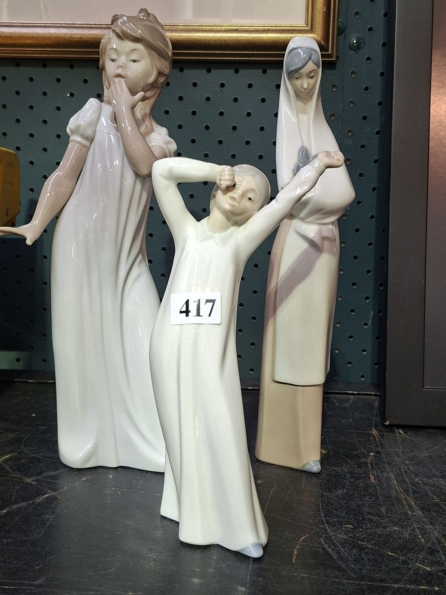 Three Nao Figurines