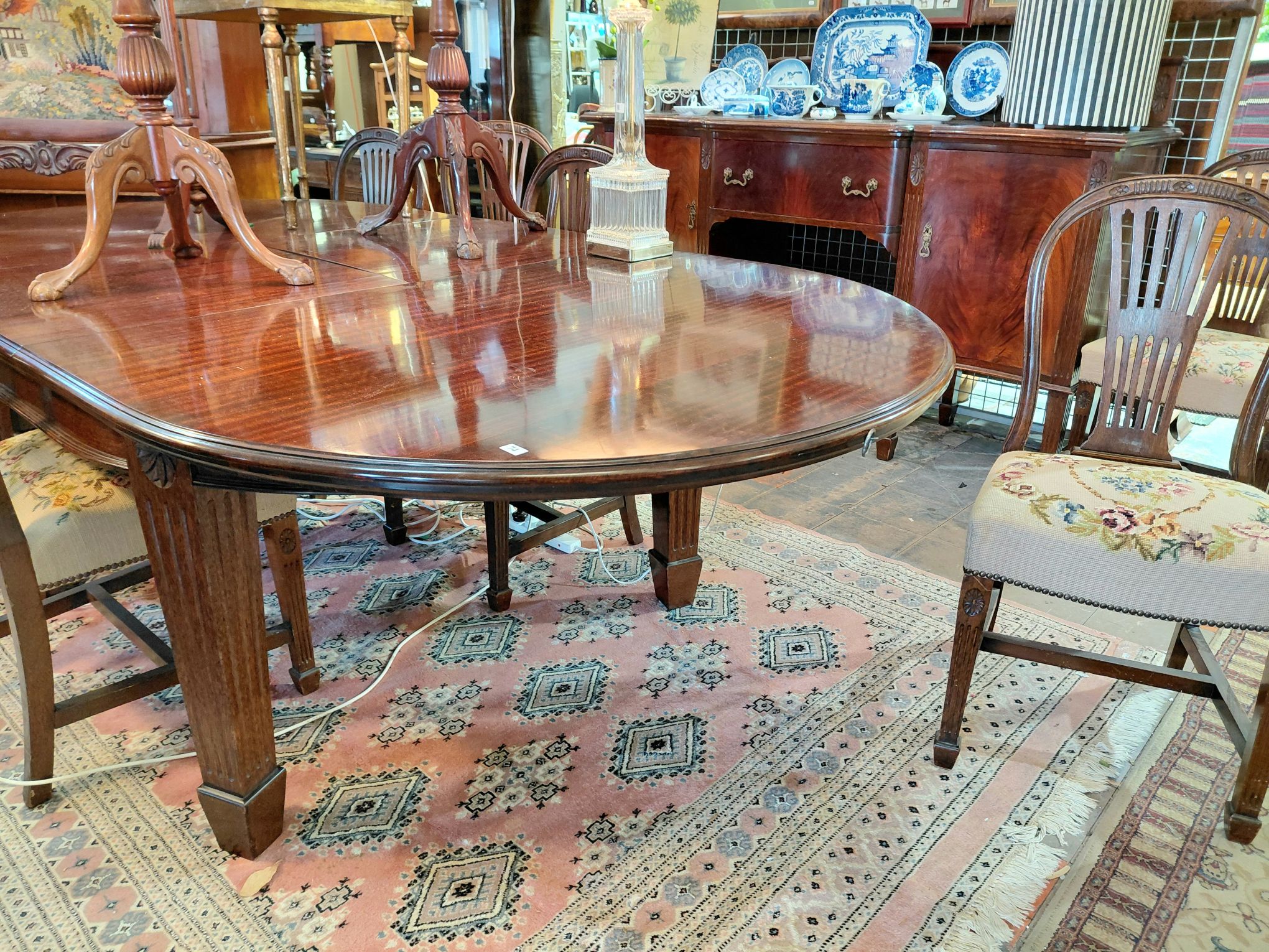 74 · A QUEENSLAND MAPLE DINING ROOM SUITE