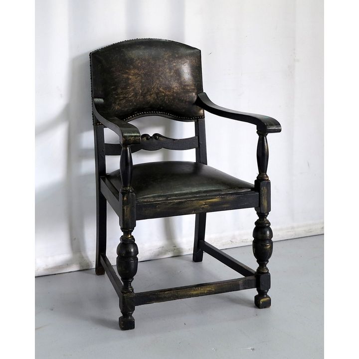 LEATHER UPHOLSTERED CARVER