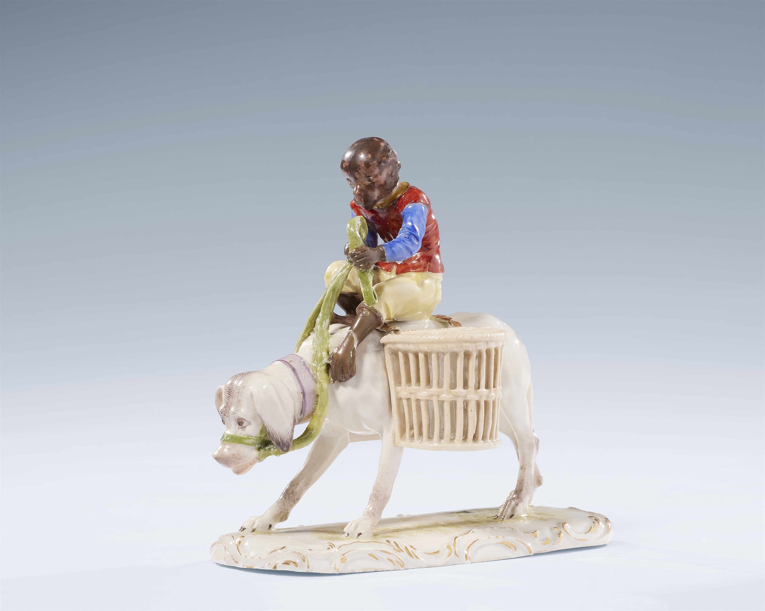 A rare Ludwigsburg porcelain group of a monkey riding a dog