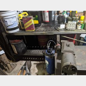 PHOTOS ADDED/INFO - Heavy steel work bench about 5 ft.